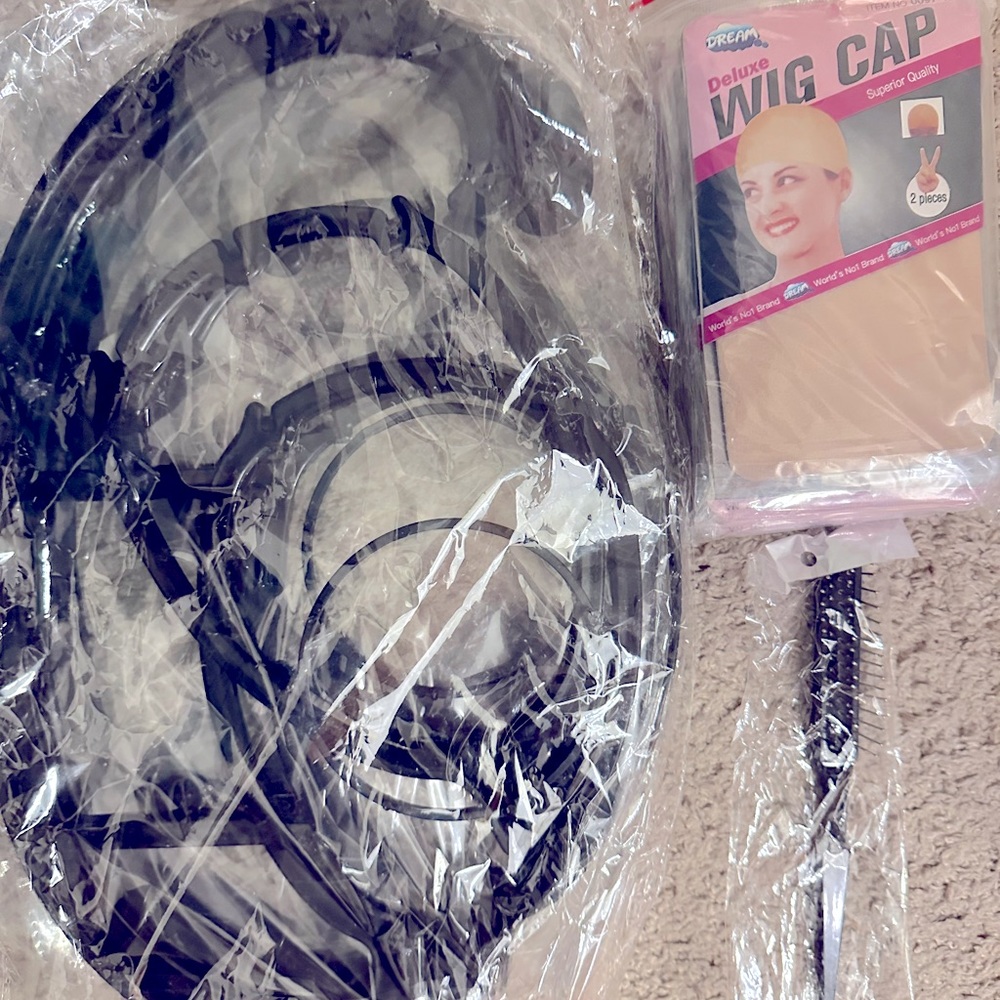 Hanging wig holders, wig caps, wig brush.